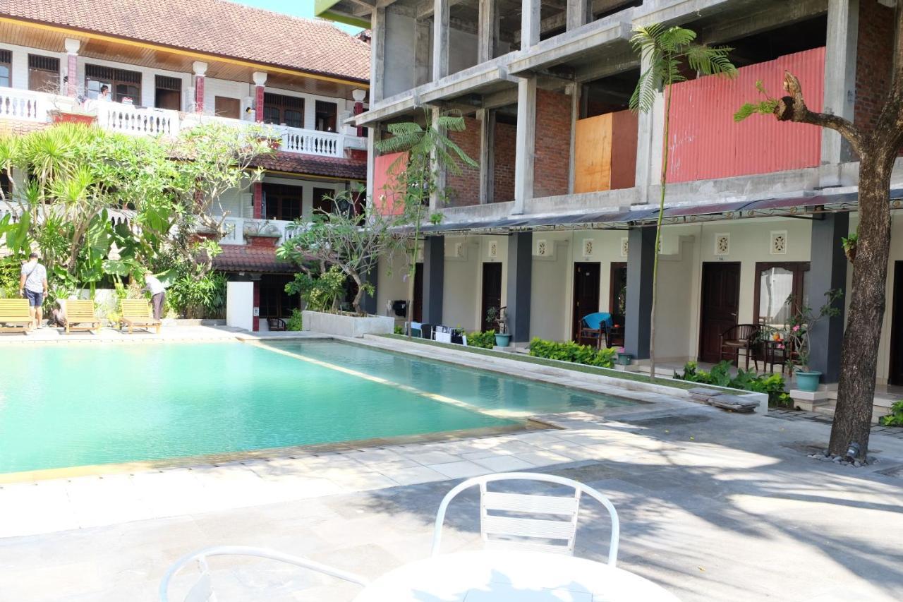 Отель Palm Garden Kuta Кута Экстерьер фото