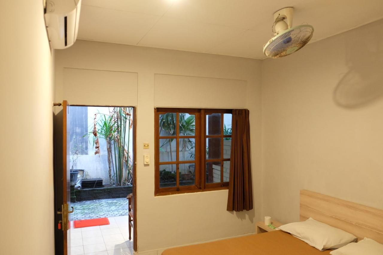 Отель Palm Garden Kuta Кута Экстерьер фото