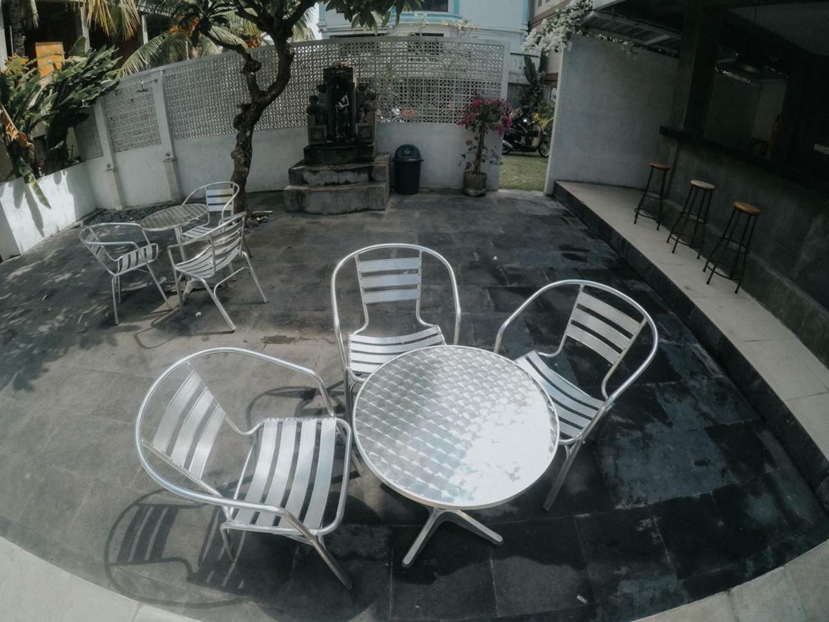 Отель Palm Garden Kuta Кута Экстерьер фото